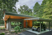 Exterior addition at Sherwood Forest residence in Brevard NC with butterfly roof design