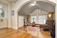 Upper-level space adapted for flexible use while maintaining the homes original character.