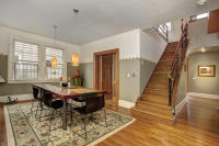 Dining area connected to stair and main living spaces to create a more open and usable layout.