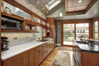 8th St Cottage renovation featuring a bright, functional kitchen with improved natural light and a more efficient layout for everyday use.